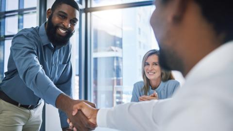 two people shaking hands