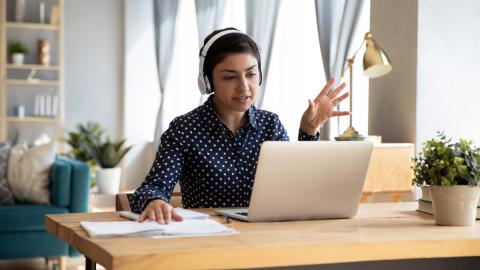 lady at desk for virtual meeting