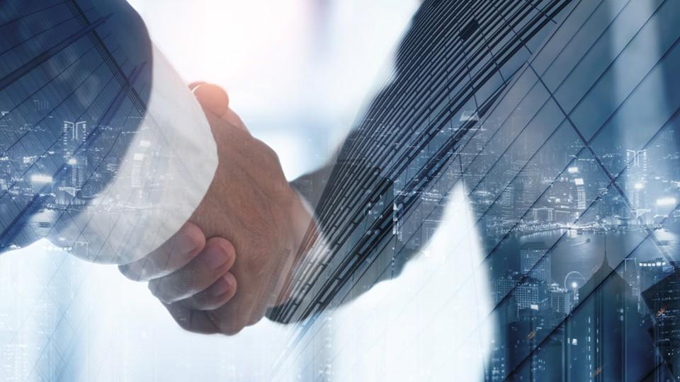 Handshake to seal a deal in the City