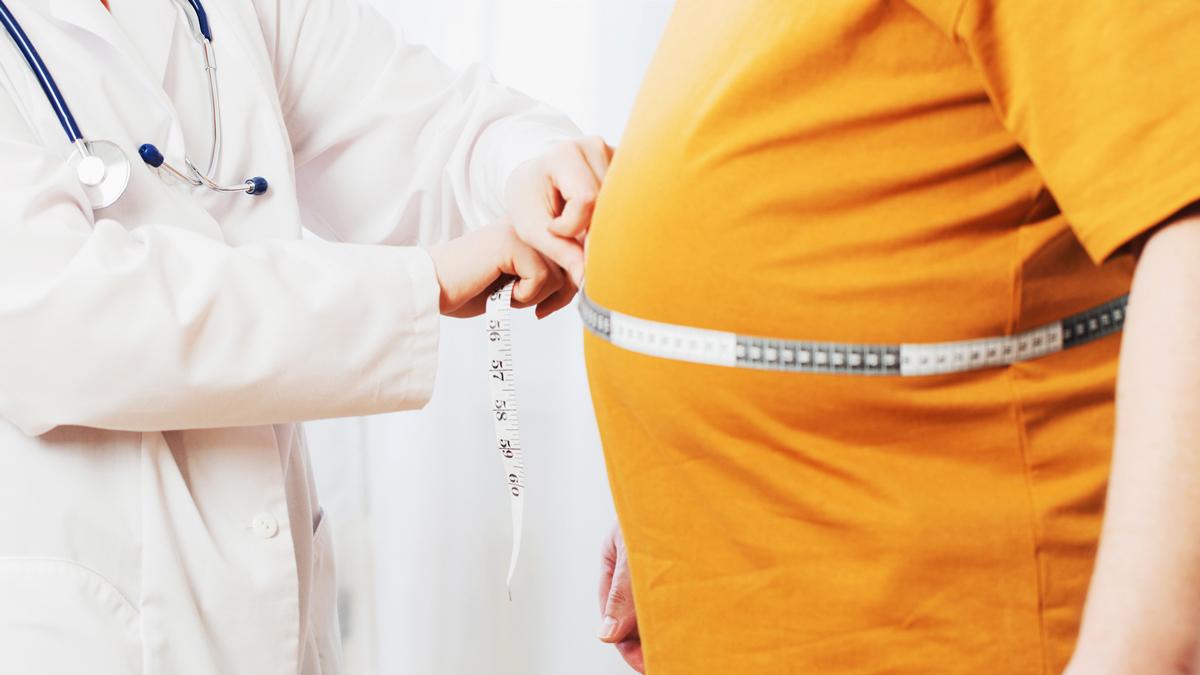 HCP measuring patient stomach