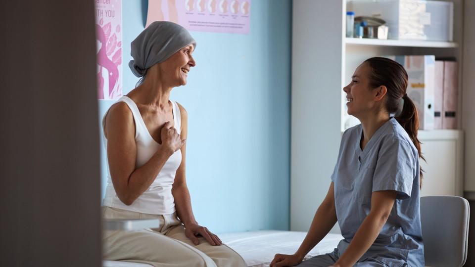 HCP in conversation with cancer patient