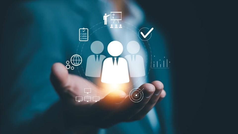 In the palm of a businessman's hand the digital hiring process in hologram