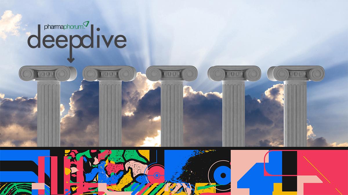 pillars with abstract art at the base