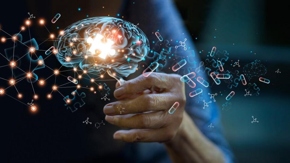 The puzzle of Alzheimer's, HCP hand holds digital graphic of brain and missing puzzle piece