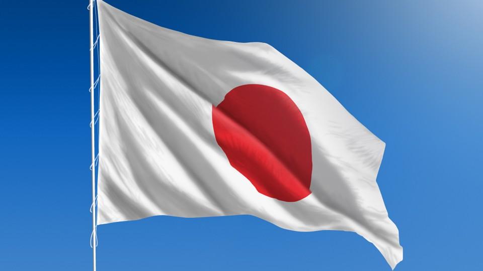Japan's flag, blue sky background