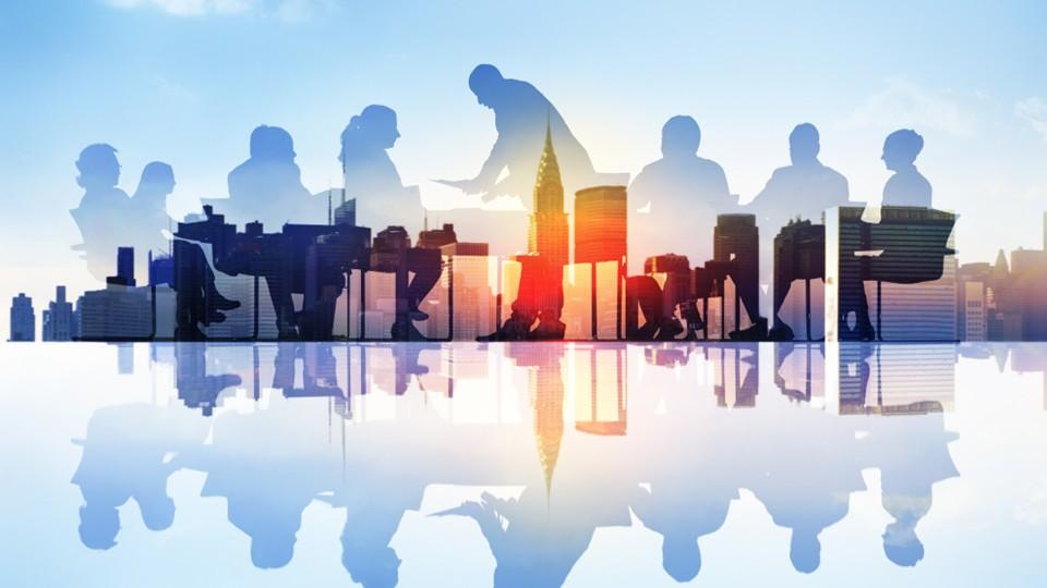 Board of Directors graphic over sunset across cityscape