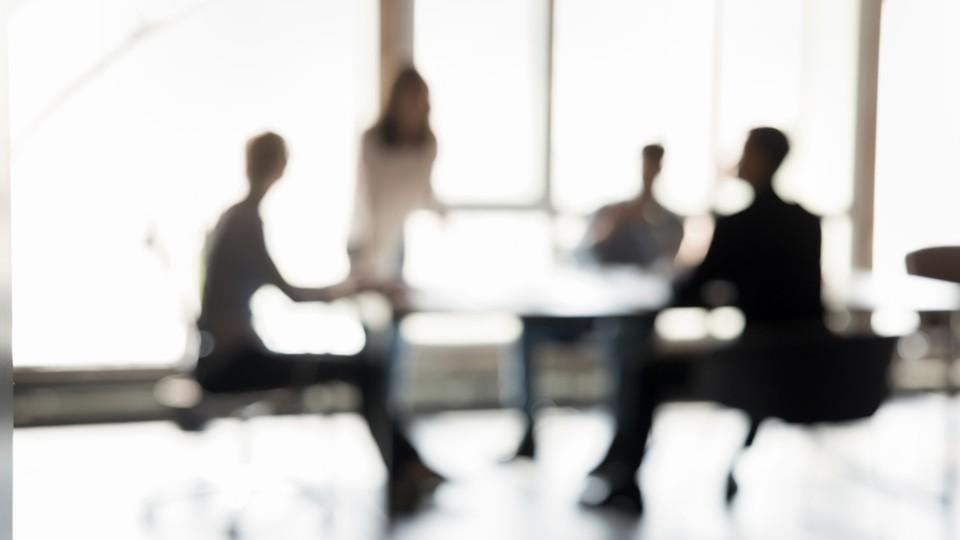 Blurred image of an advisory board