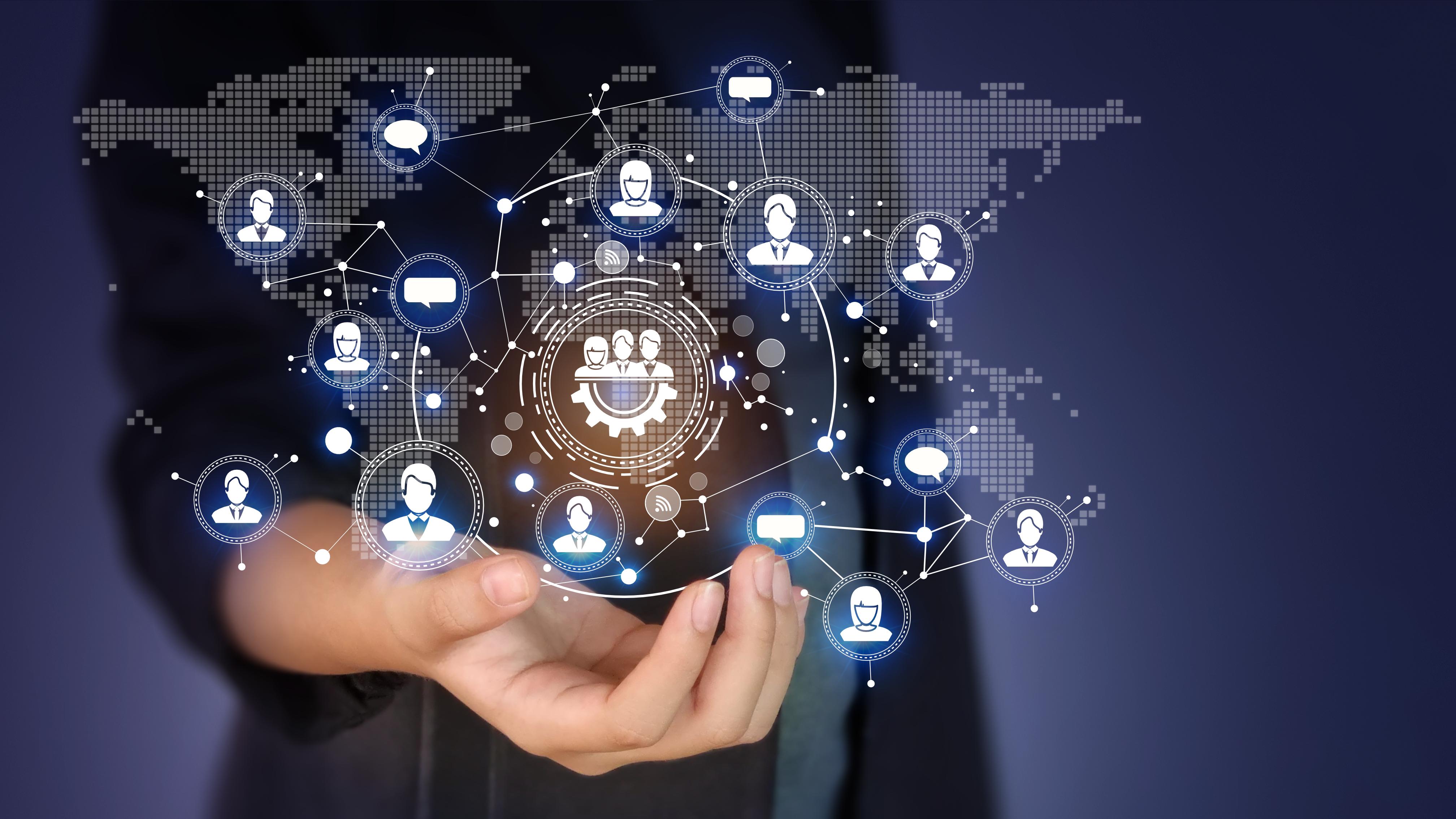 Omnideployment concept, female hand holds digital globe and connected networks of men and women