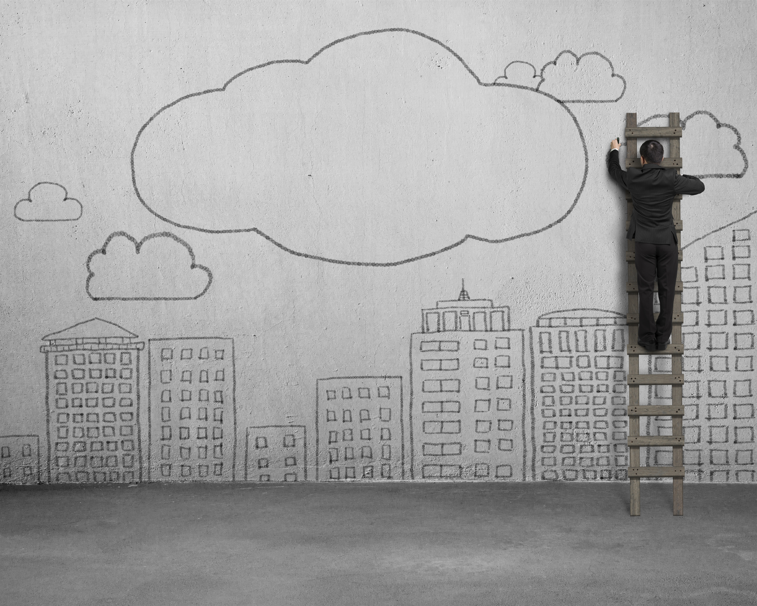 Climbing ladder businessman drawing clouds with copy space and city buildings doodles on concrete wall.