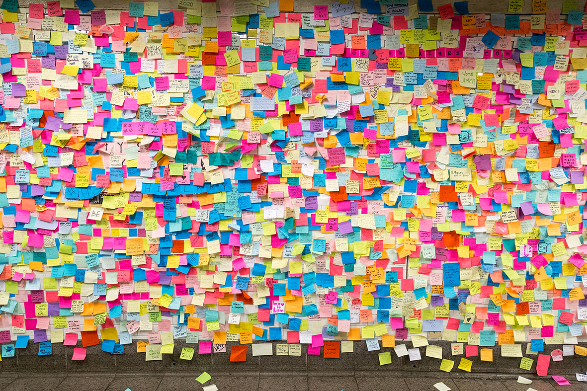 New York, United States of America - November 21, 2016: Sticky post-it notes on wall in Union Square subway station in NYC as protest against presidential election results