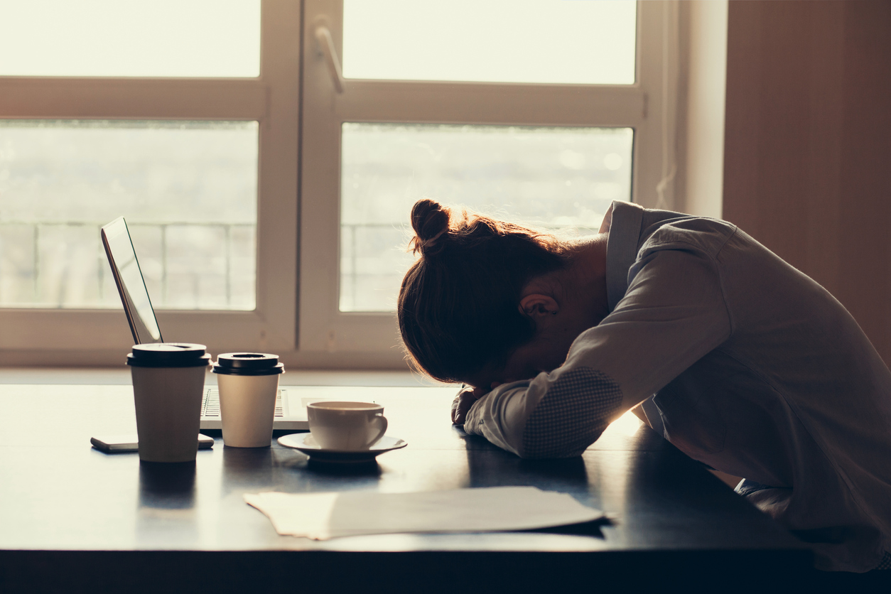 Tired businesswoman in the office