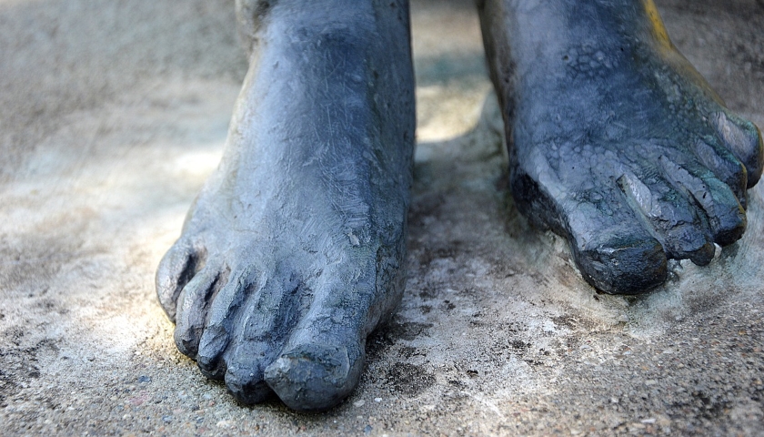 Feet on a statue