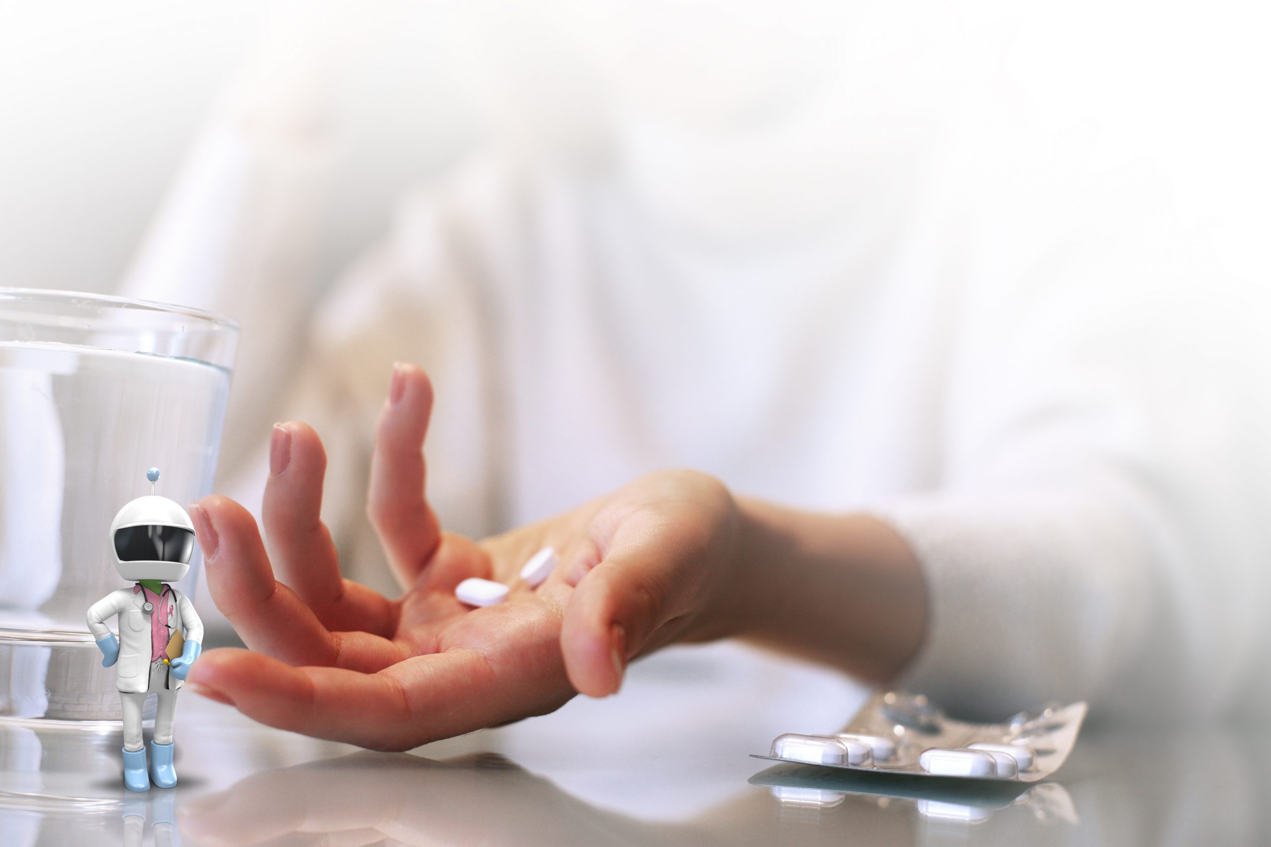 Close up of woman hands holding a pills.