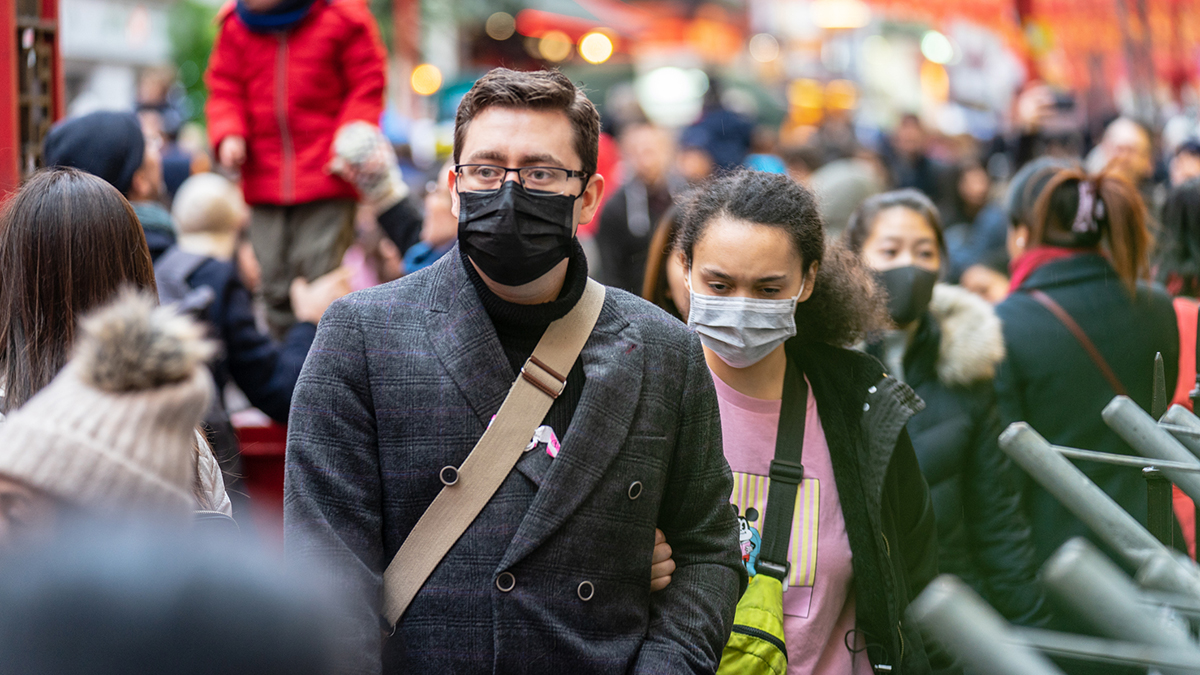 London, January 26, 2020. People wearing a face masks to protecting themself because of epidemic in China. Selective Focus. Concept of coronavirus quarantine. MERS-Cov, middle East respiratory syndrome coronavirus, Novel coronavirus 2019-nCoV.