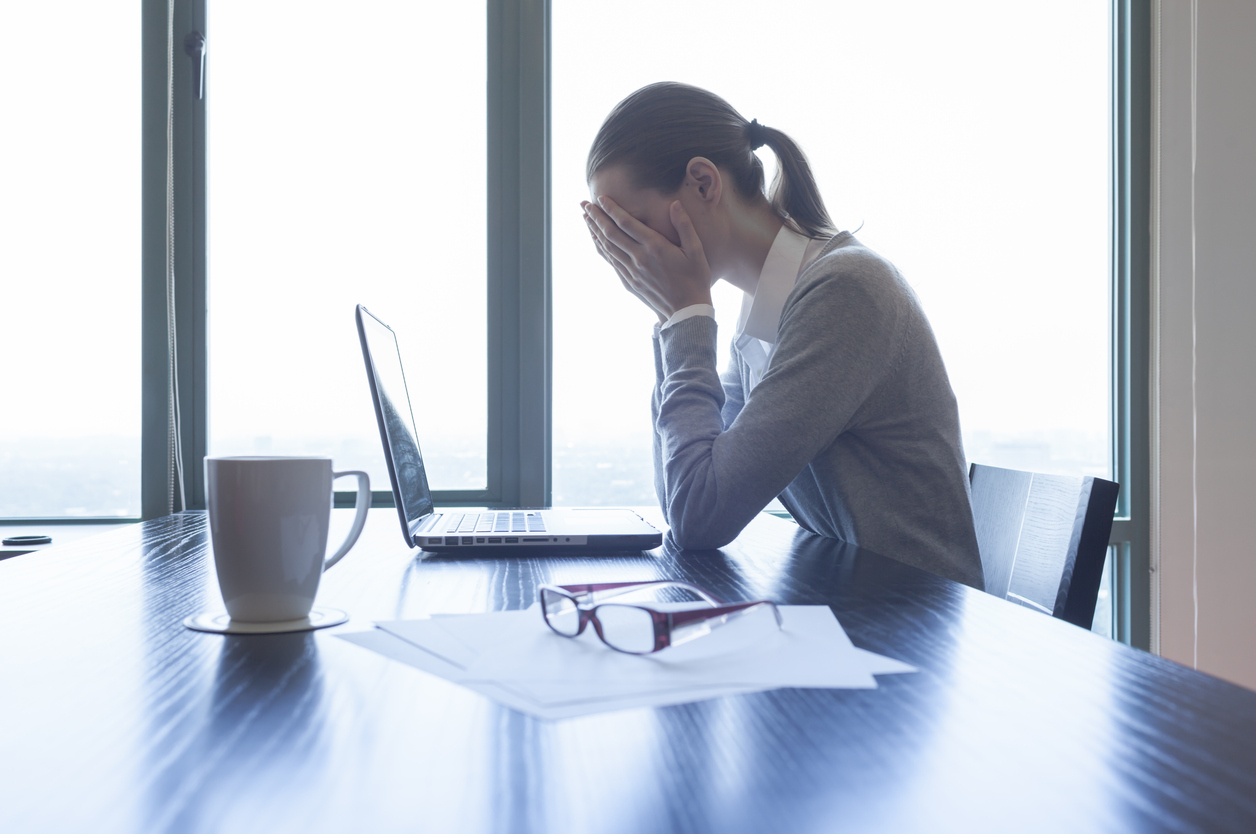 Stressed businesswoman in the office.