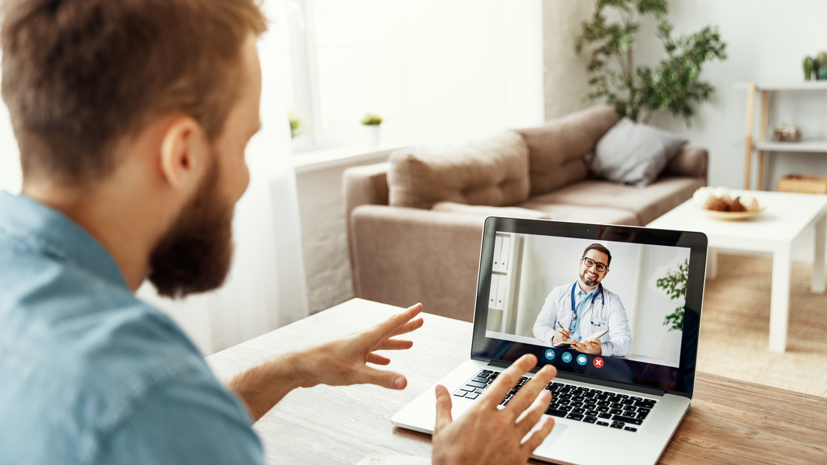 Pharma sales rep talking to a GP over video conferencing