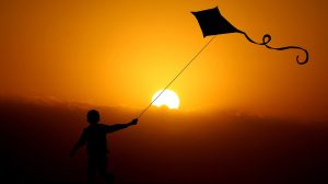 child-flying-kite